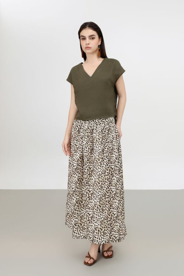 Áo Cổ V Nút Sau Vải Linen – Phong Cách Thanh Lịch 2025